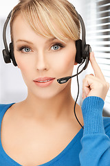 Image showing friendly female helpline operator