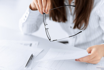 Image showing woman hands with blank paper