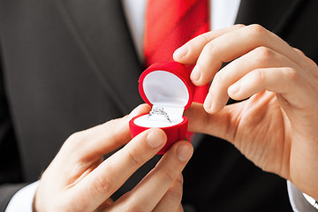 Image showing man with wedding ring and gift box