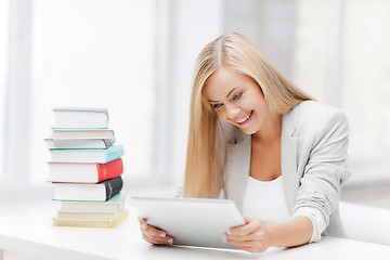 Image showing student with books and tablet pc