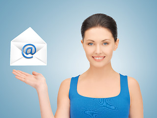 Image showing woman showing virtual envelope