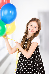 Image showing happy girl with colorful balloons