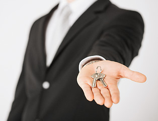 Image showing man holding house keys