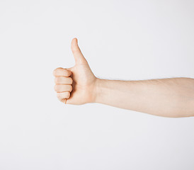 Image showing man showing thumbs up