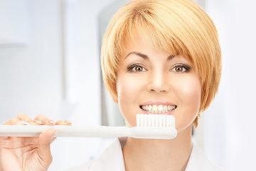 Image showing doctor with toothbrush