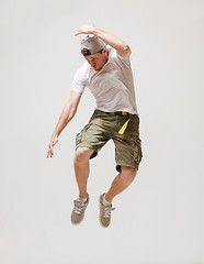 Image showing male dancer jumping in the air