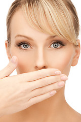 Image showing woman covering her mouth