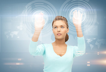 Image showing businesswoman working with something imaginary