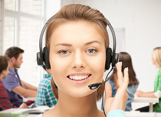 Image showing helpline operator with headphones
