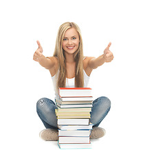 Image showing student with stack of books