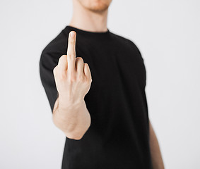 Image showing man showing middle finger