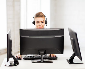 Image showing friendly female helpline operator