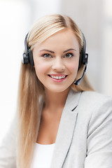 Image showing friendly female helpline operator