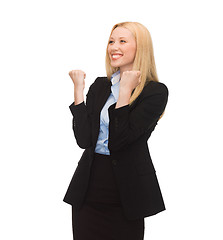 Image showing happy woman with hands up