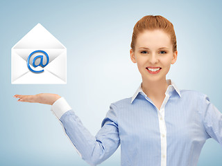 Image showing woman showing virtual envelope