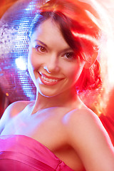 Image showing woman with disco ball