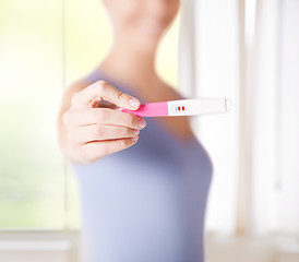 Image showing woman with pregnancy test