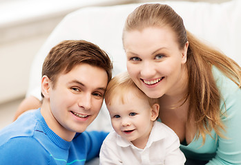 Image showing happy family with adorable baby