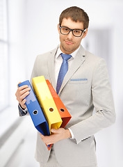 Image showing man with folders