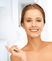 Image showing beautiful woman with moisturizing creme drop