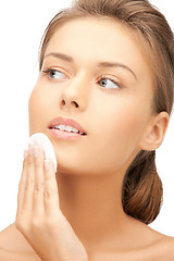 Image showing beautiful woman with cotton pad