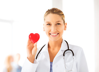 Image showing female doctor with heart