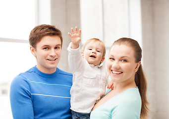 Image showing happy family with adorable baby