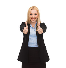 Image showing young businesswoman with thumbs up