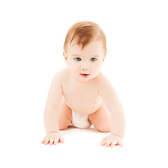 Image showing crawling curious baby