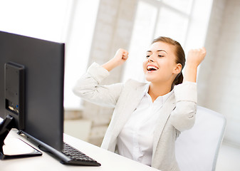 Image showing businesswoman with computer in office