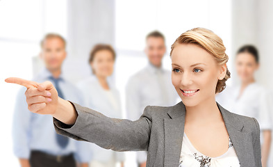 Image showing businesswoman pointing her finger