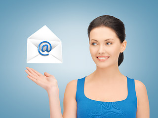 Image showing woman showing virtual envelope