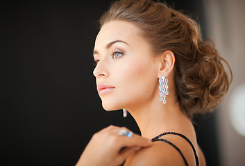 Image showing woman with diamond earrings