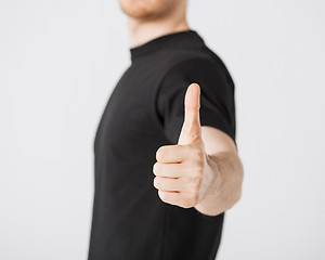 Image showing man showing thumbs up