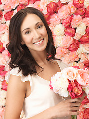 Image showing woman with background full of roses