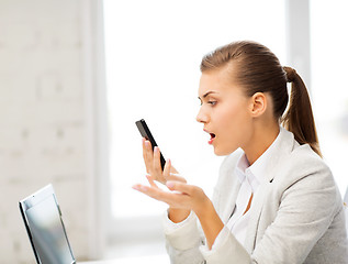Image showing woman shouting into smartphone