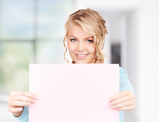 Image showing happy woman with blank board