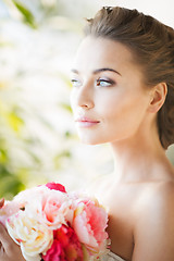 Image showing bride with bouquet of flowers