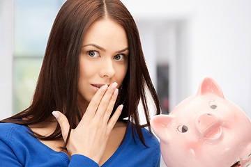 Image showing lovely woman with piggy bank