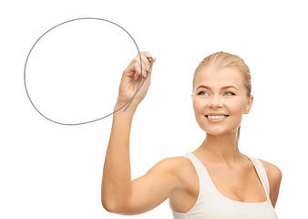 Image showing woman drawing round shape