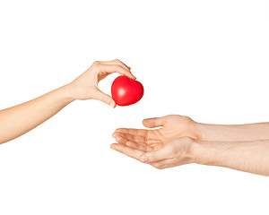 Image showing woman and man hands with heart