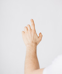 Image showing man hand pointing at something