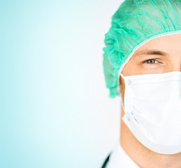 Image showing surgeon in medical cap and mask