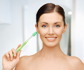 Image showing woman with toothbrush