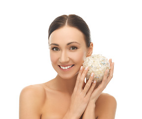 Image showing woman with salt ball for bathing