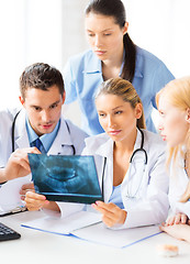 Image showing young group of doctors looking at x-ray