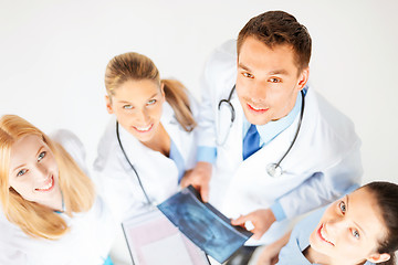 Image showing young group of doctors looking at x-ray