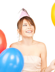 Image showing happy girl with colorful balloons