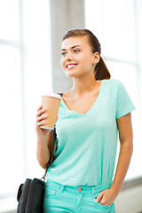 Image showing student holding take away coffee cup