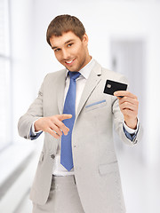 Image showing businessman with credit card